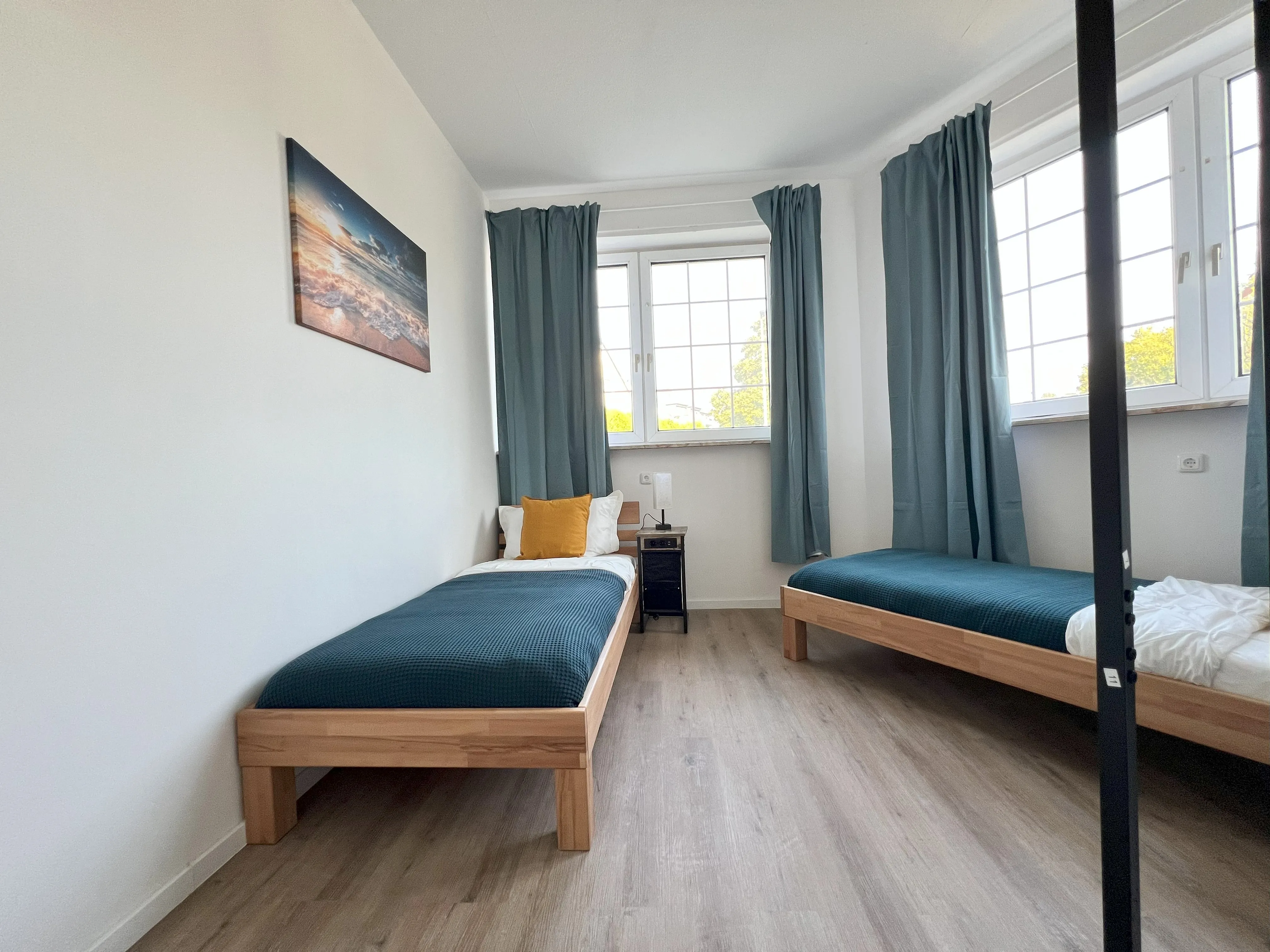 Zwei Einzelbetten in Apartment in Duisburg
